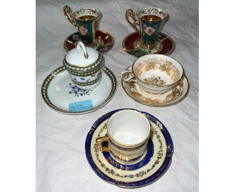 A Hammersley Rose Point cup and saucer; a Royal Limoges chocolate cup and saucer; a pair of Bavaria cups and saucers and anot