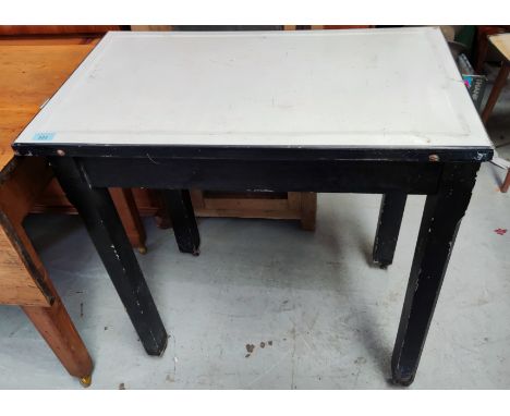 An enamel top butcher's/kitchen table, 76 x 46cm, height 76cm 