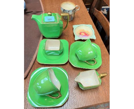 A Bursley Ware bachelor's 'tea for two' service in green and gilt.&nbsp; a Bursley cup with verse "Oh Dear What Can the Matte