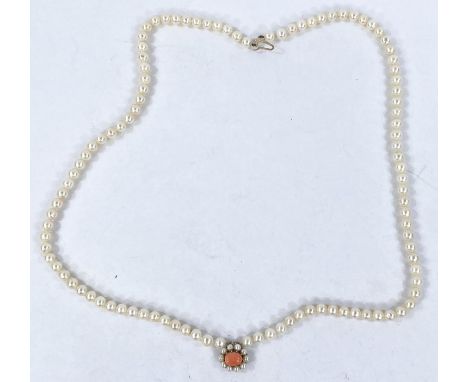 A single strand pearl necklace with 9 carat hallmarked gold clasp set central coral and 10 seed pearls (pearls 6mm diameter) 