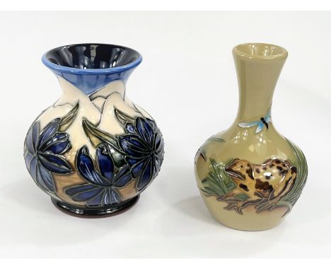 A modern Moorcroft small squat baluster vase decorated with blue flowers on a multicoloured ground, impressed and dated 2005;