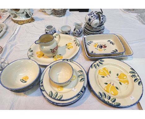 A hand painted Poole pottery part dinner service decorated with pears including platters etc; a Royal Copenhagen style onion 