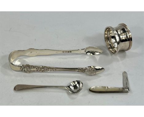 A large pair of Georgian&nbsp;hallmarked silver sugar tongs, London 1827; a&nbsp;hallmarked silver tea spoon 1832; a&nbsp;hal