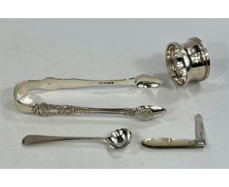 A large pair of Georgian&nbsp;hallmarked silver sugar tongs, London 1827; a&nbsp;hallmarked silver tea spoon 1832; a&nbsp;hal