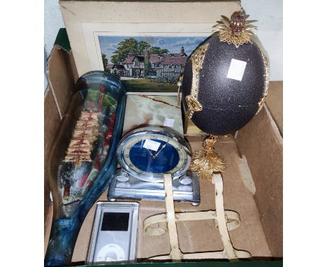 A selection of collectors items:&nbsp; a ship in a bottle; a Fabergé&nbsp;style egg; an Art Deco mantel clock; etc. 