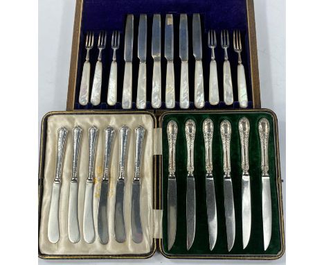 A set of mother of pearl and hallmarked silver knives and forks, Sheffield 1920, a cased set of silver handled fruit knives a
