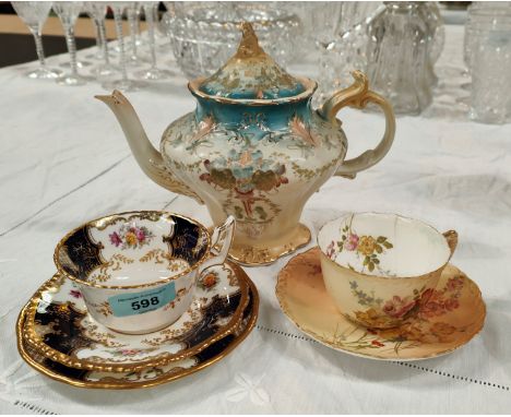 A Coalport Batwing Trio set Y.665; a Royal Worcester ivory cup and saucer (cup hairline); an Art Nouveau teapot 