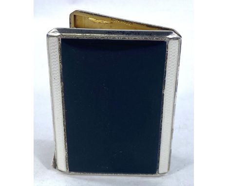 A hallmarked silver Art Deco cigarette case, engine turned with black &amp; white enamel decoration, Birmingham 1931, length 