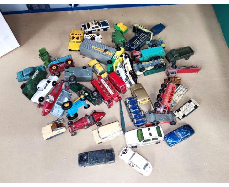 A selection of Lesney Matchbox and other vintage diecast vehicles. 