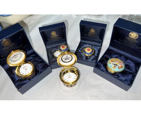 Two Royal Worcester enamel boxes with integral clocks commemorating the Millennium, boxed 