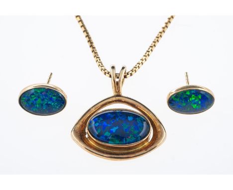 An opal doublet pendant and earrings set in silver gilt  