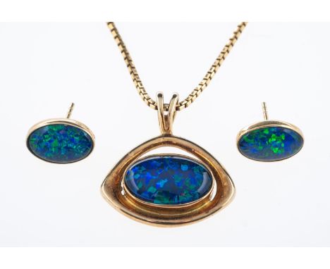 An opal doublet pendant and earrings set in silver gilt  