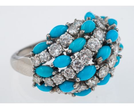 A diamond and turquoise bombe form cocktail ring with alternating bands of brilliant cut diamonds and turquoise beads, set in