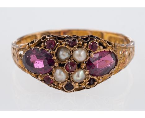 A Victorian ring set with amethyst and seed pearls, engraved band, marks for 15ct, Birm,  1879, ring size O    Condition Repo