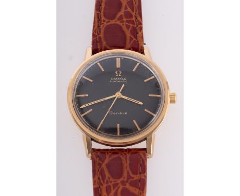 Omega Automatic Genève a gentleman's 18ct gold wristwatch the round black dial with with raised baton numerals, baton hands a