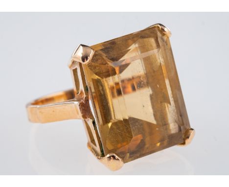 A vintage dress ring set with a large smoky yellow citrine stone, ring size G, 14ct gold, gross weight, 9.3grams   Condition 