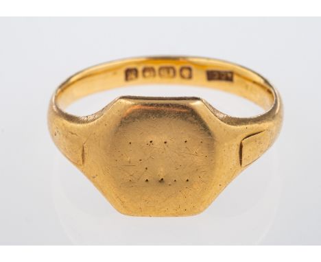 A gold ring signet ring, hallmarked 18ct,  Birmingham 1936, weight 7.1 grams, in leather ring box   Condition Report Initials