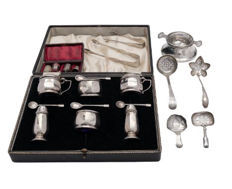 A silver six piece cruet set by Roberts & Dore Ltd, Birmingham 1936, round faceted, in a box with two salt and two mustard sp