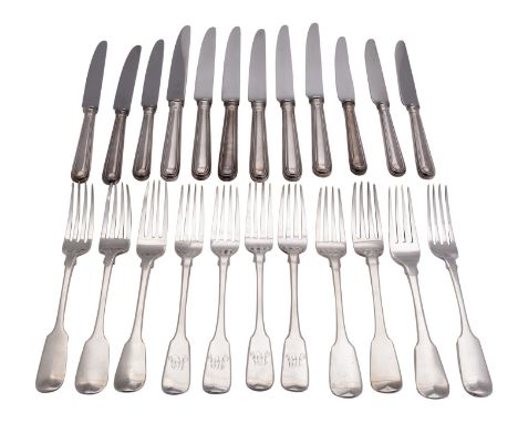 Nine matched silver Fiddle pattern table forks, various dates and makers, all Exeter and early 19th century, together with a 