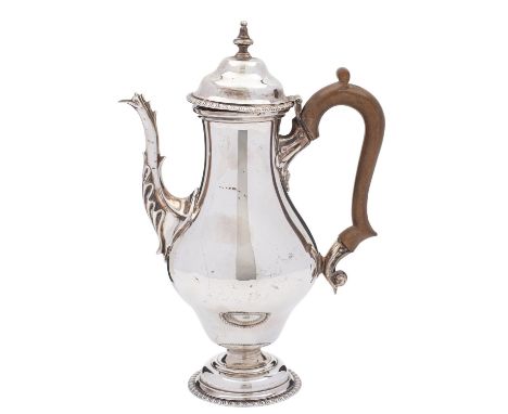 A silver small coffee pot by The Goldsmiths & Silversmiths Co. Ltd, London 1913, in mid Georgian ogee baluster style, with a 