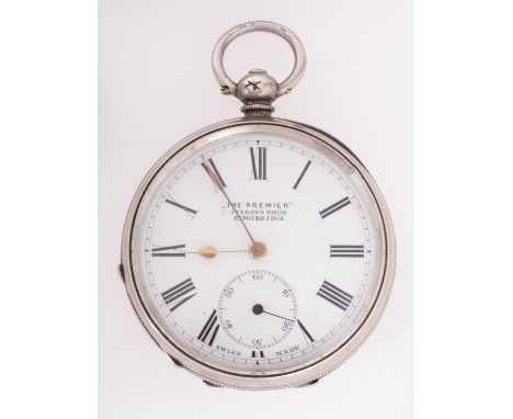 A silver pocket watch the dial having a subsidiary seconds dial and signed for the retailer The Premier, Iverson Bros., Kings