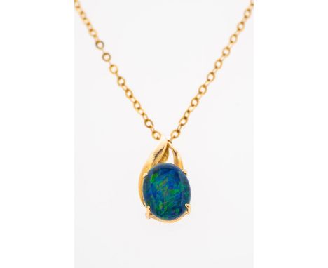 An opal pendant set in 18ct gold, on fine 9ct gold chain   Condition Report  Opal possibly a doublet, 