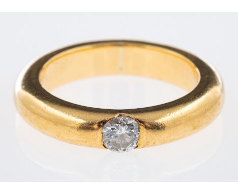 A heavy gold band ring single stone diamond ring inset with a diamond of 0.25 carats, 18ct gold    Condition Report  Gross we