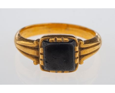 An antique gold signet ring set with black jasper, in hand crafted high carat gold setting, weight 5 grams, ring size J-K    