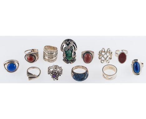 Carl Ove Frydensberg, a Danish patinated silver and hardstone ring, a Mexican silver mask ring and a group of vintage silver 