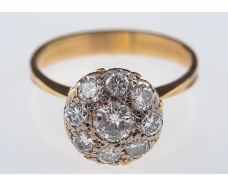 A vintage 1970's diamond cluster ring,set with brilliant cut diamonds, total diamond weight estimated at 1.20 carat, and cent