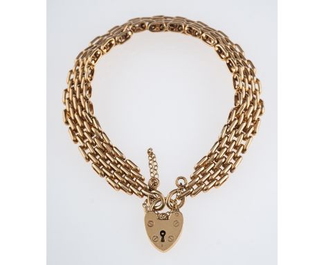 A gold gate link bracelet with heart clasp, 9ct gold length 18cm.weight 24.5 grams   Condition Report  Good condition, clasp 