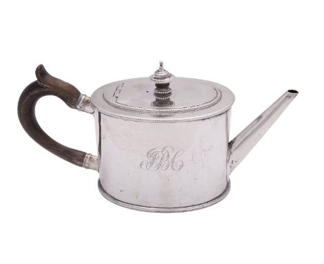 A George III silver tea pot by Charles Aldridge & Henry Green, London 1777, straight-sided oval, with a composition button fi