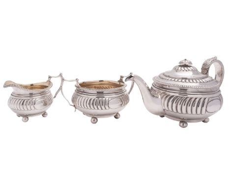 A late George III Scottish silver three piece tea service by William & Patrick Cunningham, Edinburgh 1814, compressed circula