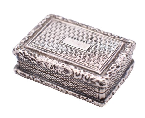 A George IV silver vinaigrette by John Bettridge, Birmingham 1825, rectangular with a vacant reserve on an engine turned grou