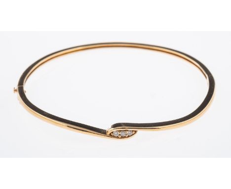 A contemporary gold hinged bangle set with three small diamonds, interior size 5.7 cm, 9ct weight  7.4 grams    Condition Rep