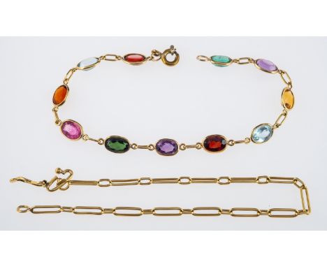 A multi gem set bracelet set with pink and blue topaz, amethyst and garnet, in unmarked gold, and an oblong link chain  and a