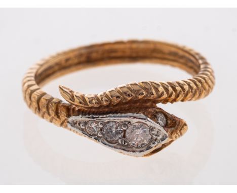 A gold  ring in the form of a serpent the head set with diamonds, 18ct, ring size O