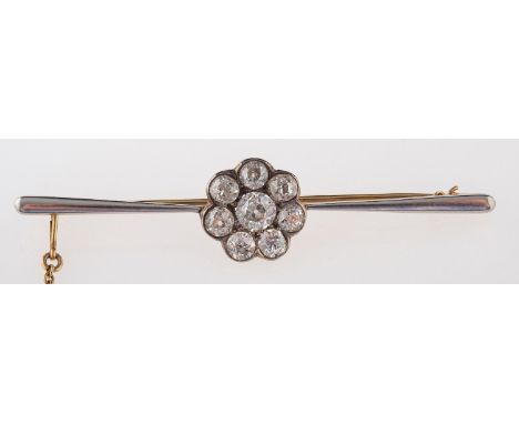 A diamond cluster brooch, the central old brilliant cut diamond, estimated to weigh 0.45 carats, within a surround of old bri