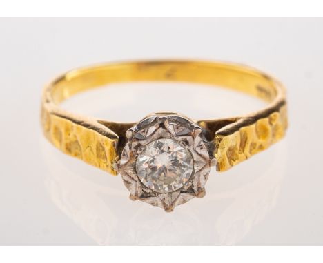 A diamond single stone ring, the brilliant cut diamond, estimated to weigh 0.25 carats, stamped 18ct, ring size J