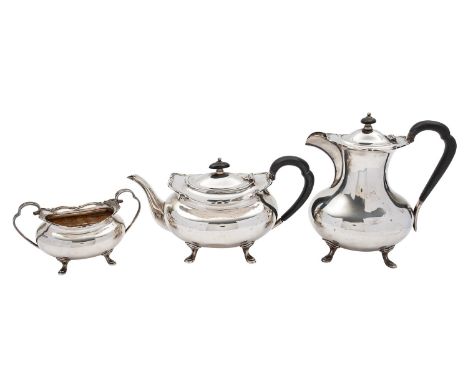 A George V silver three piece tea service by Atkin Brothers, Sheffield 1933, of baluster form, comprising of a tea pot, hot w