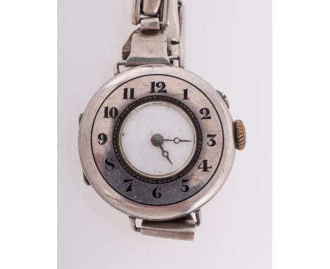 A lady's silver half-hunter wristwatch the white enamel dial with blued-steel moon hands, the movement having a lever escapem