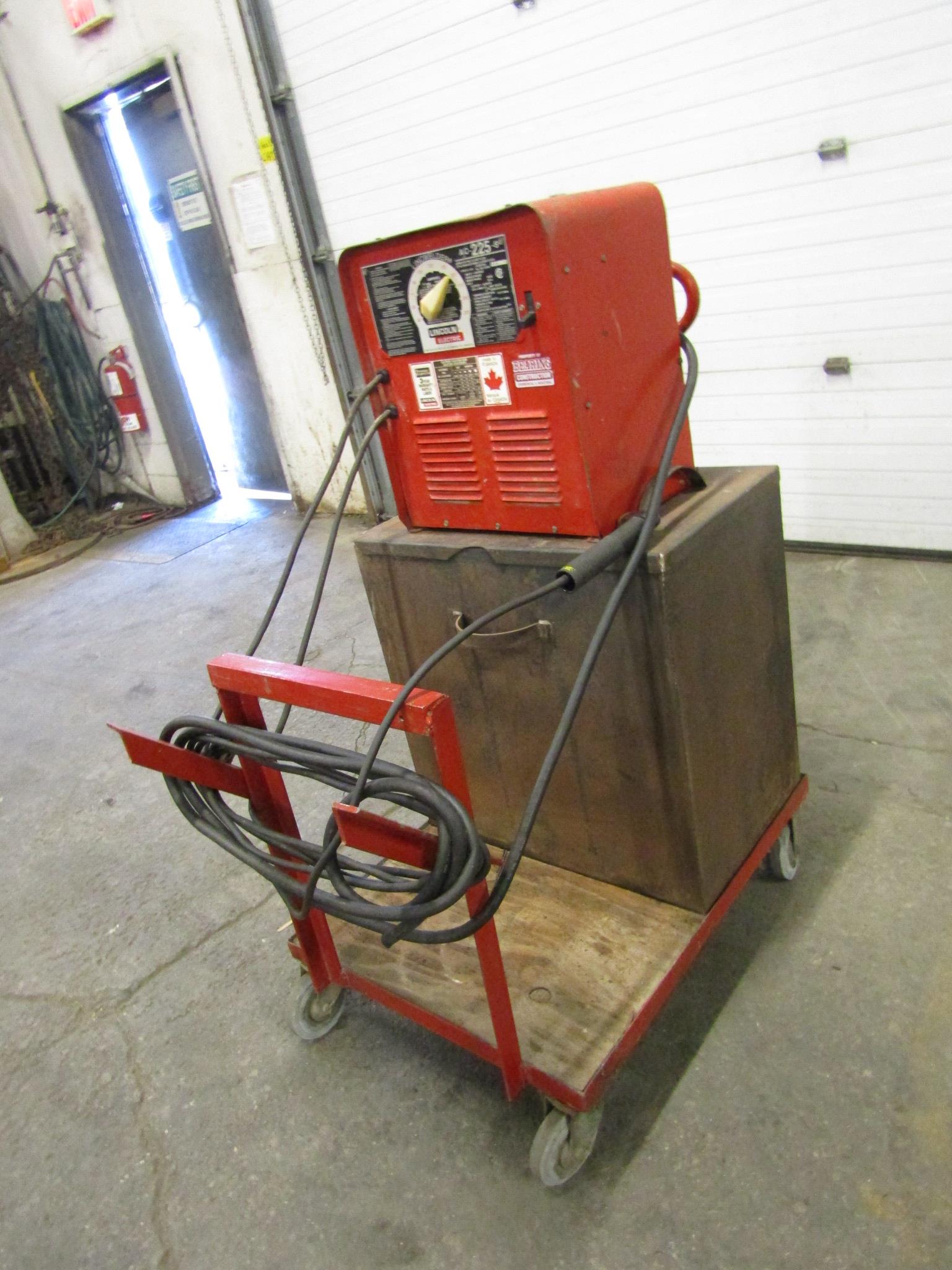 Lincoln Electric AC225S Arc Welder on cart with box with accessories