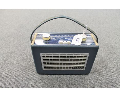 A vintage radio : Hacker Mini Herald in blue. 