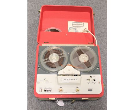 A Dansette consort portable tape recorder with original retail tag.