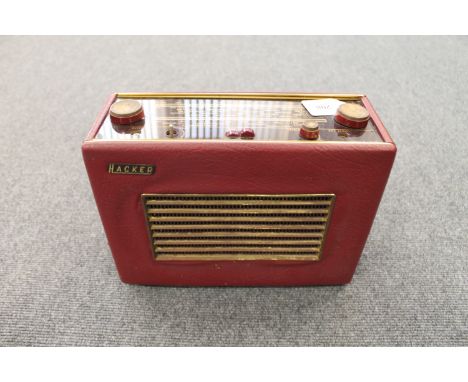 A vintage radio : Hacker Herald RP 30 in Burgundy case.