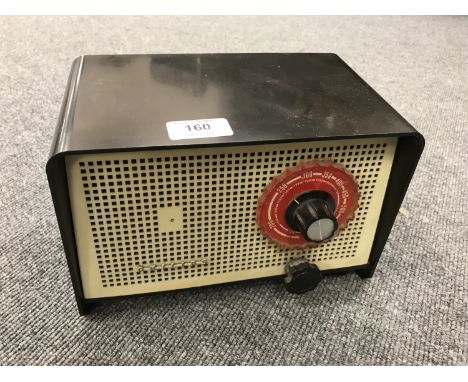 A vintage radio : Philips in a black Bakelite case. 