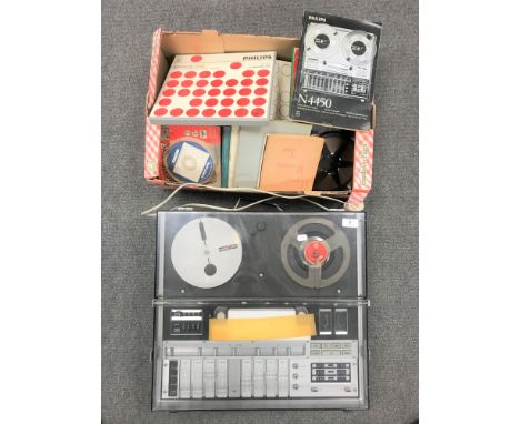 A Philips N4450 automatic reserve reel to reel player, together with two boxes containing reels and manual.