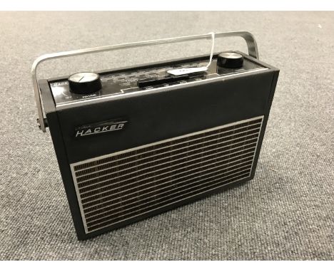 A vintage radio : Hacker Autocrat, model number RP 33. 