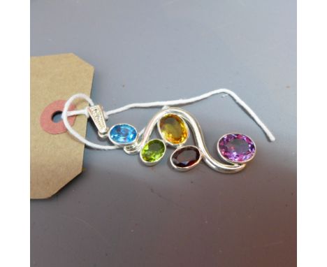 A hallmarked silver, peridot, garnet, citrine, amethyst and blue topaz pendant 