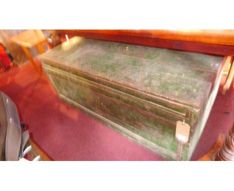 A green painted shipping trunk with hand painted crest H 56 x W 134 x D73cm 